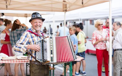 An accordion player at the feast at the pavillon