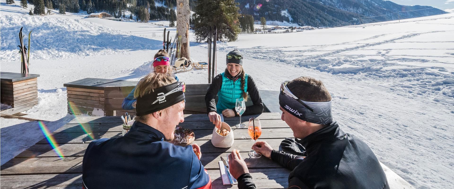 Cross-country skiers having a meal