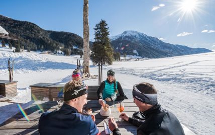 Cross-country skiers having a meal